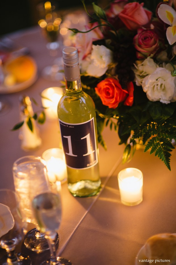 table numbers with wine bottles with logo